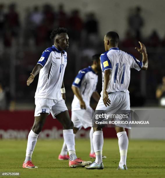 Honduras' forward Alberth Elis celebrates with Honduras' Rony Martinez after scoring against Panama during a FIFA World Cup Russia 2018 Concacaf...