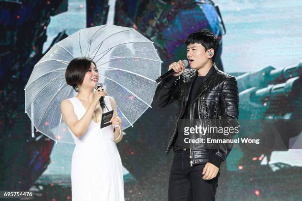 Host Kelly Cha and Singer Jason Zhang attend the 'Transformers: The Last Knight' China World Premiere and Ten Year Anniversary Celebration at...