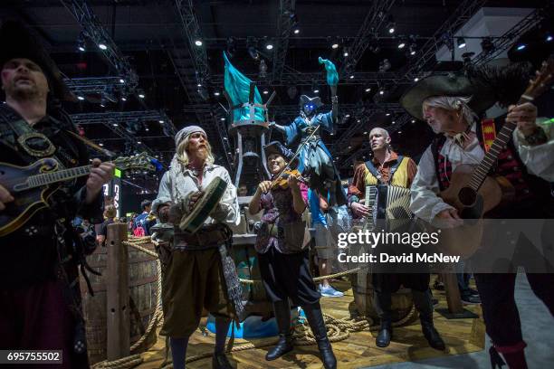 Band sings pirate themed songs at the X Box exhibit on opening day of the Electronic Entertainment Expo at the Los Angeles Convention Center on June...