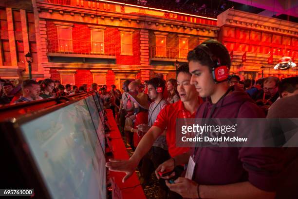 People game in the Nintendo exhibit on opening day of the Electronic Entertainment Expo at the Los Angeles Convention Center on June 13, 2017 in Los...