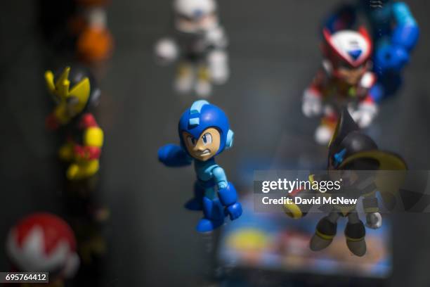 Megaman figurines are displayed on opening day of the Electronic Entertainment Expo at the Los Angeles Convention Center on June 13, 2017 in Los...