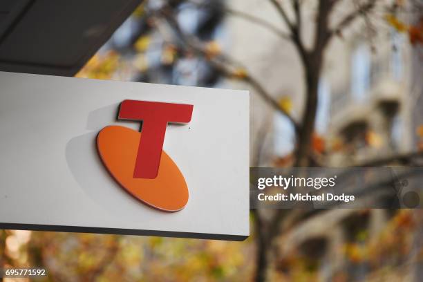 Telstra logo is seen outside the Telstra Melbourne headquarters on June 14, 2017 in Melbourne, Australia. Telecommunications company Telstra is...