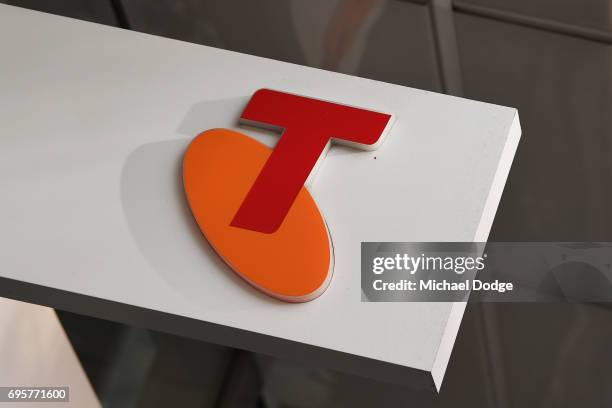 Telstra logo is seen outside the Telstra Melbourne headquarters on June 14, 2017 in Melbourne, Australia. Telecommunications company Telstra is...