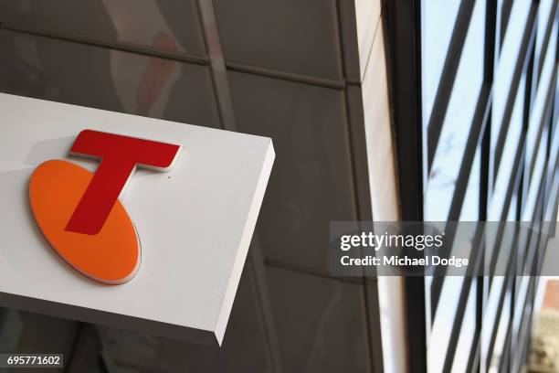 Telstra logo is seen outside the Telstra Melbourne headquarters on June 14, 2017 in Melbourne, Australia. Telecommunications company Telstra is...