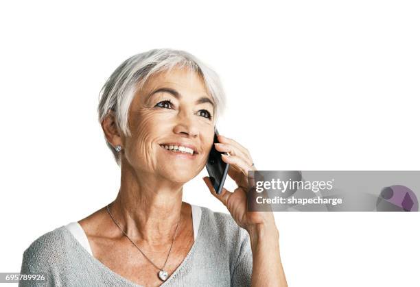 it's always lovely to hear from you - woman on phone isolated stock pictures, royalty-free photos & images