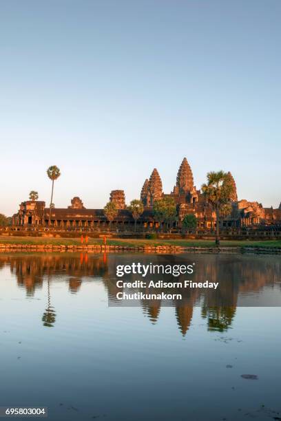 angkor wat in the sunset - angkor wat stock pictures, royalty-free photos & images