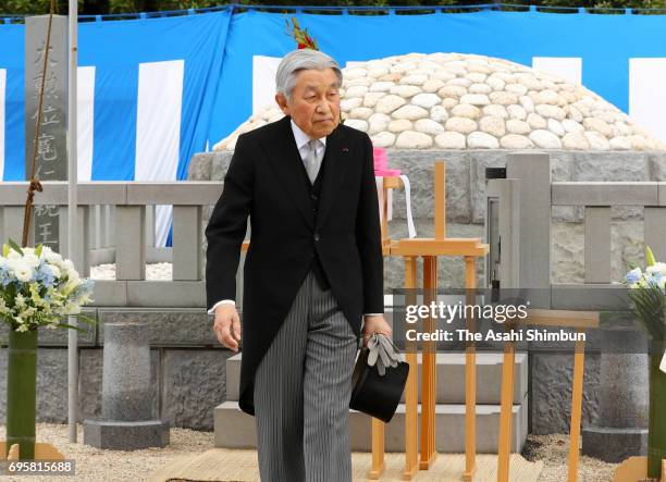 Emperor Akihito visits the grave of late Prince Tomohito of Mikasa at Toshimagaoka Cemetery on June 14, 2017 in Tokyo, Japan.