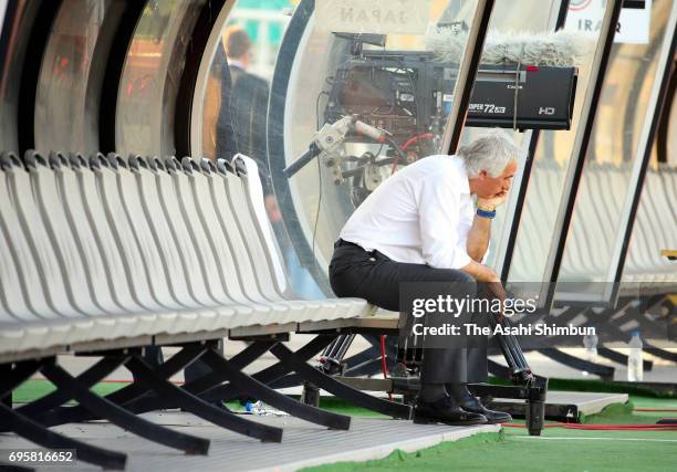 Head coach Vahid Halilhodzic of Japan remains on the bench after his side's 1-1 draw in the FIFA World Cup Russia Asian Final Qualifier match between...