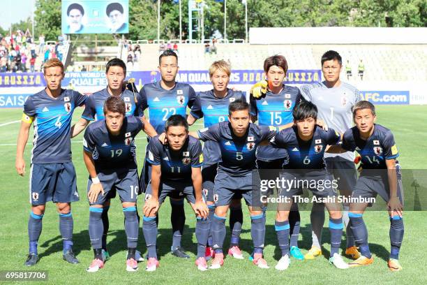 Japanese players line up for the team photos prior to the FIFA World Cup Russia Asian Final Qualifier match between Iraq and Japan at PAS Stadium on...