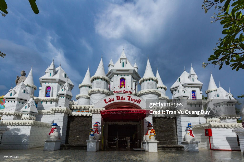 Snow castle in children water park and historical theme amusement park Suoi Tien - popular south Vietnam travel destination.