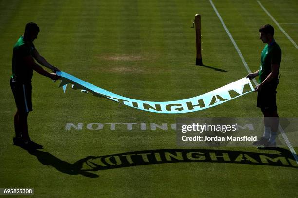 Groundstaff prepare the courts ahead of the start of play on day three of the Aegon Open Nottingham at Nottingham Tennis Centre on June 14, 2017 in...