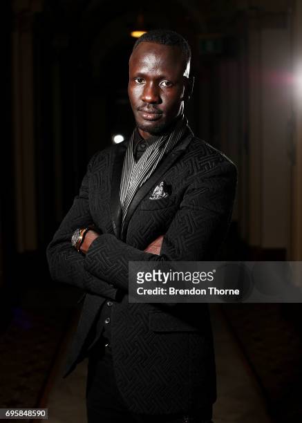 Deng Adut, 2017 NSW Australian of the Year poses prior to 'RightsTalk: Inspiring change in human rights' at Sydney Town Hall on June 14, 2017 in...