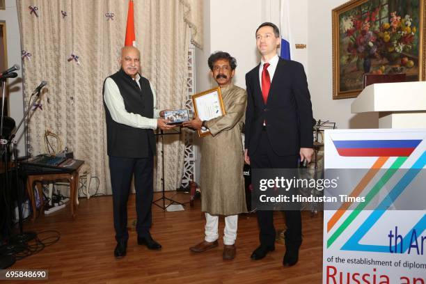 Akbar and Anatoly Kargapolov during the celebration of the National Day of Russia hosted by the Embassy of the Russian Federation, on June 12, 2017...