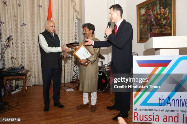 Akbar and Anatoly Kargapolov during the celebration of the National Day of Russia hosted by the Embassy of the Russian Federation, on June 12, 2017...