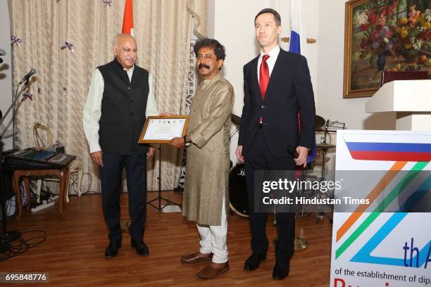 Akbar and Anatoly Kargapolov during the celebration of the National Day of Russia hosted by the Embassy of the Russian Federation, on June 12, 2017...