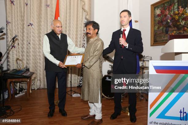 Akbar and Anatoly Kargapolov during the celebration of the National Day of Russia hosted by the Embassy of the Russian Federation, on June 12, 2017...