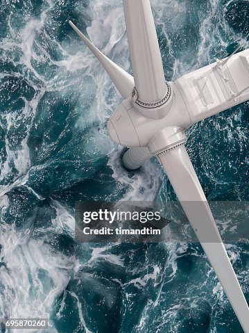 Close up of a wind turbine in the sea Close up of a wind turbine in the sea