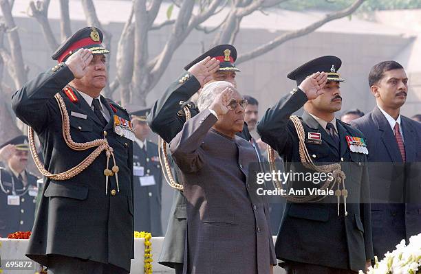 Indian President K. R. Narayanan salutes the grave of political and spiritual leader Mahatma Gandhi who was murdered by a Hindu extremist in 1948...