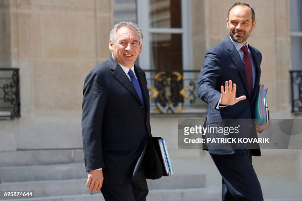 French Prime Minister Edouard Philippe and French Minister of Justice Francois Bayrou leave a cabinet meeting on June 14, 2017 at the Elysee Palace,...