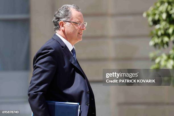 French Minister of Territorial Cohesion Richard Ferrand leaves a cabinet meeting on June 14, 2017 at the Elysee Palace, in Paris. / AFP PHOTO /...