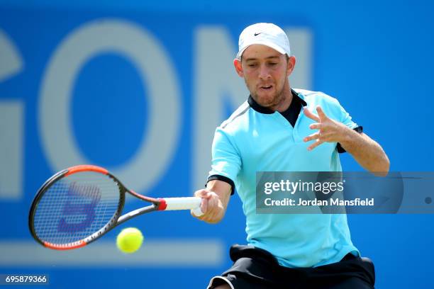 Dudi Sela of Israel plays a forehand during his Men's second round match against Ricardas Berankis of Lithuania during day three of the Aegon Open...