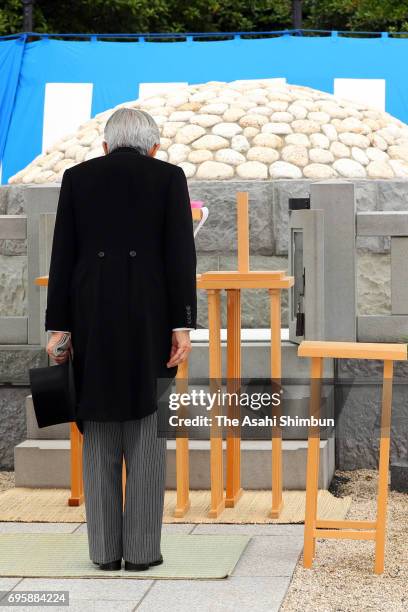 Emperor Akihito visits the grave of late Prince Tomohito of Mikasa at Toshimagaoka Cemetery on June 14, 2017 in Tokyo, Japan.