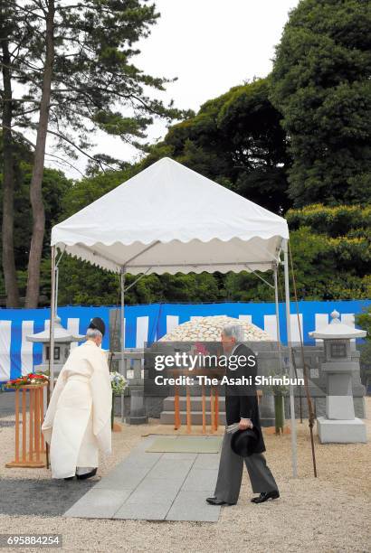 Emperor Akihito visits the grave of late Prince Tomohito of Mikasa at Toshimagaoka Cemetery on June 14, 2017 in Tokyo, Japan.