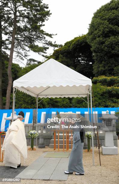 Empress Michiko visits the grave of late Prince Tomohito of Mikasa at Toshimagaoka Cemetery on June 14, 2017 in Tokyo, Japan.