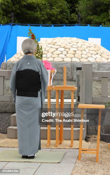 Empress Michiko visits the grave of late Prince Tomohito of Mikasa at Toshimagaoka Cemetery on June 14, 2017 in Tokyo, Japan.