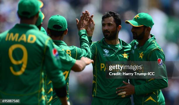 Junaid Khan of Pakistan celebrates after dismissing Moeen Ali of England during the ICC Champions Trophy Semi Final match between England and...