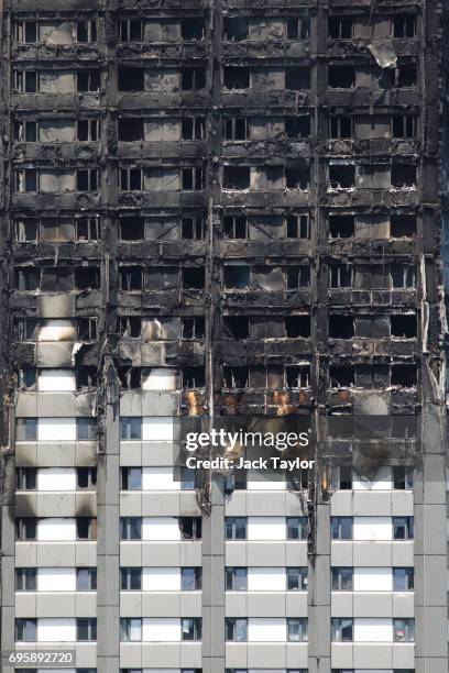 The Grenfell Tower block stands after a huge fire engulfed the 24 storey residential building in Latimer Road, West London in the early hours of this...