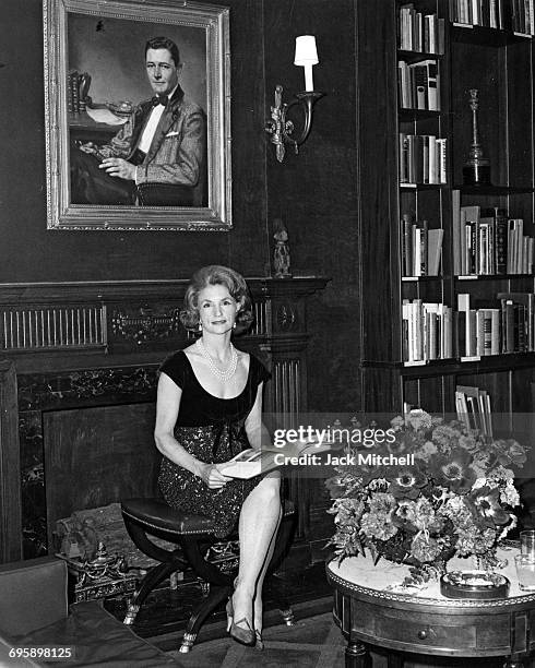 Rebekah Harkness, composer, sculptor, dance patron, and philanthropist who founded the Harkness Ballet, photographed in her office in 1964.