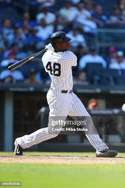 Chris Carter of the New York Yankees in action against the Baltimore Orioles at Yankee Stadium on June 11, 2017 in the Bronx borough of New York...