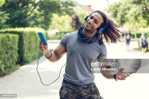 dancing in the park - young men dance stock pictures, royalty-free photos & images