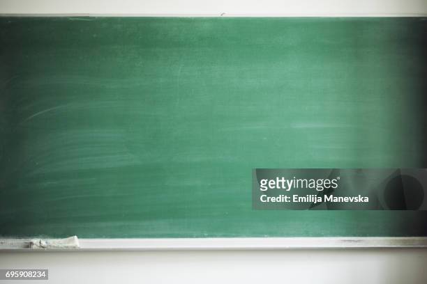 blank blackboard with board eraser - board fotografías e imágenes de stock
