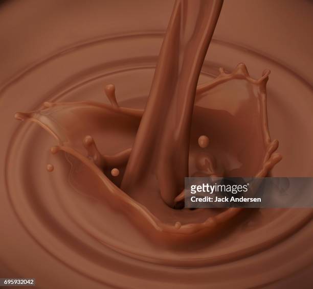 chocolate milk splash - chocolate milk stock pictures, royalty-free photos & images