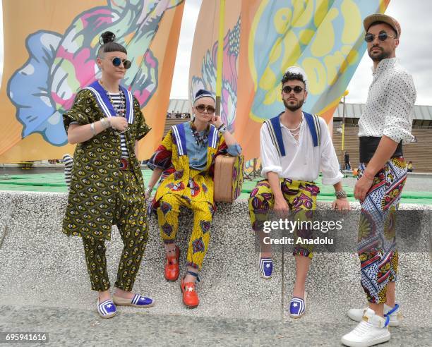 People attend 92nd Pitti Immagine Uomo, which is one of the worlds most important platforms for mens clothing and accessory collections, in Florence,...
