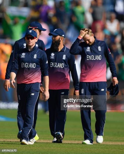 England captain Eoin Morgan leaves the field with his team after the ICC Champions Trophy semi final between England and Pakistan at SWALEC Stadium...