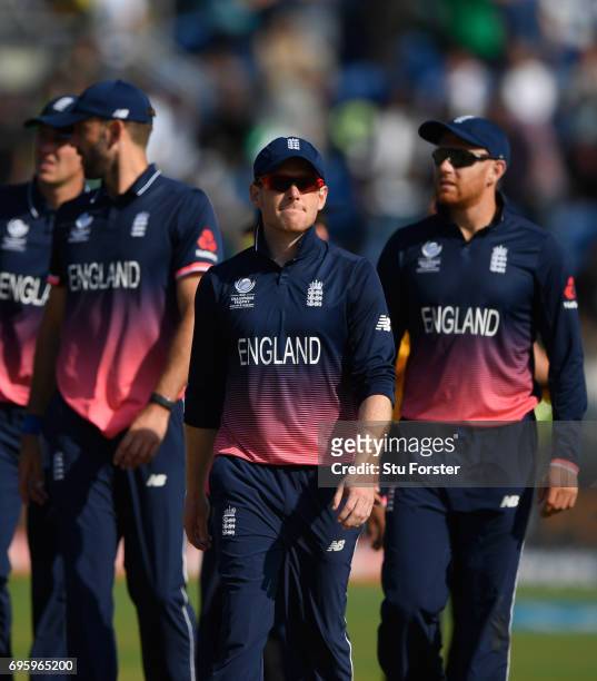 England captain Eoin Morgan leaves the field with his team after the ICC Champions Trophy semi final between England and Pakistan at SWALEC Stadium...