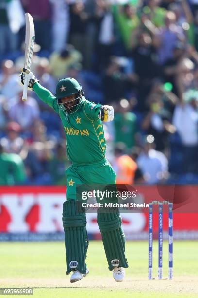 Mohammad Hafeez of Pakistan celebrates hitting the winning runs and victory by 8 runs during the ICC Champions Trophy Semi-Final match between...