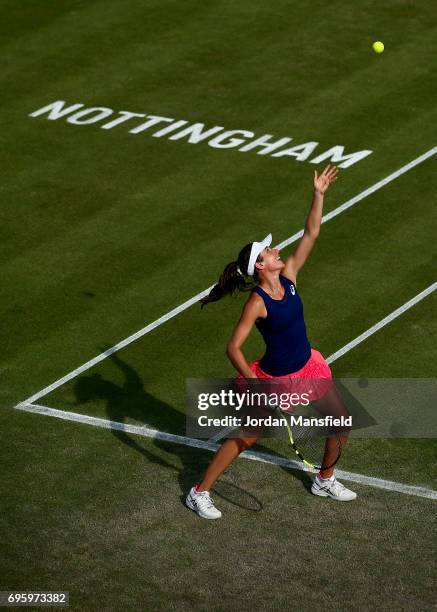 Johanna Konta of Great Britain serves partnering Yanina Wickmayer of Belgium during their Women's doubles first round match against Chia-Jung Chuang...