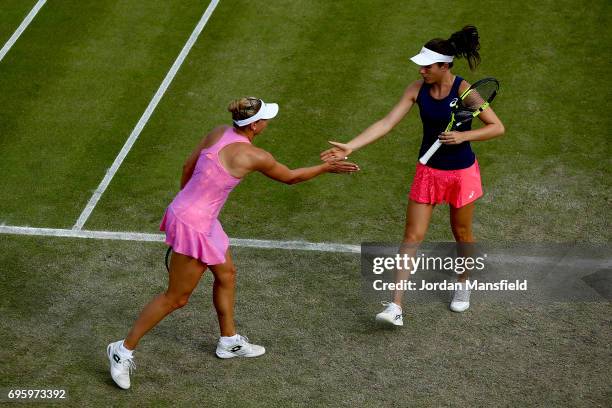 Yanina Wickmayer of Belgium and Johanna Konta of Great Britain during their Women's doubles first round match against Chia-Jung Chuang of Chinese...