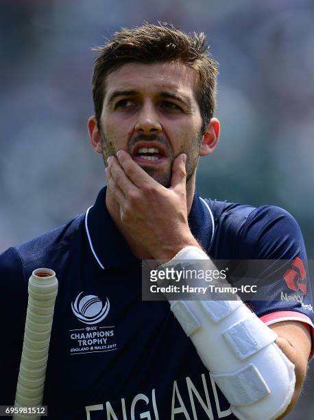 Mark Wood of England reacts after being run out during the ICC Champions Trophy Semi Final match between England and Pakistan at the SWALEC Stadium...