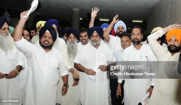 Punjab former Deputy CM Sukhbir Singh Badal along with Akali senior leaders protesting outside Punjab Vidhan Sabha Session on June 14, 2017 in...