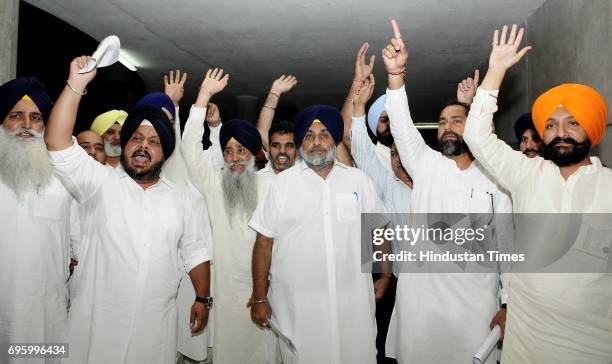 Punjab former Deputy CM Sukhbir Singh Badal along with Akali senior leaders protesting outside Punjab Vidhan Sabha Session on June 14, 2017 in...