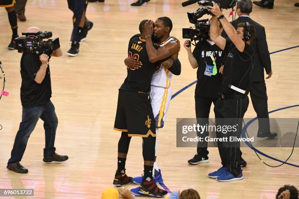 LeBron James of the Cleveland Cavaliers congratulates Kevin Durant of the Golden State Warriors in Game Five of the 2017 NBA Finals on June 12, 2017...