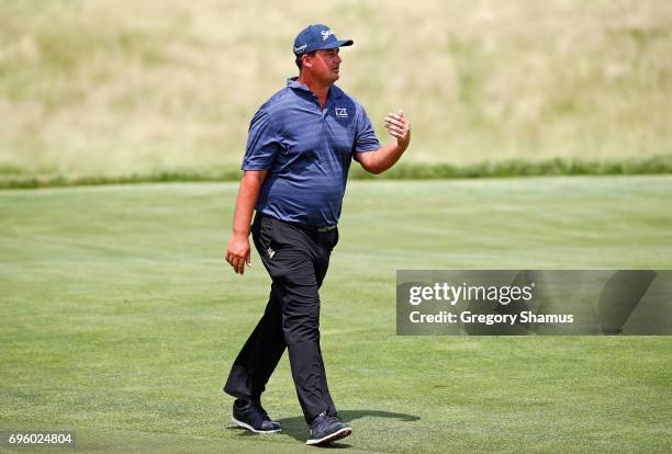 Michael Putnam of the United States walks across the course during a practice round prior to the 2017 U.S. Open at Erin Hills on June 14, 2017 in...