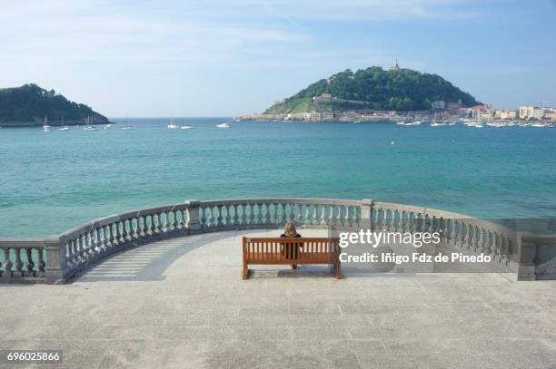 a woman in san sebastián -san sebastián- guipuzcoa - basque country - spain - san sebastián españa fotografías e imágenes de stock