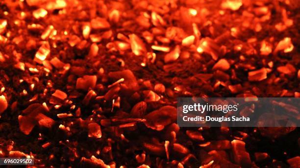 burning embers in a fireplace - burning embers stock pictures, royalty-free photos & images