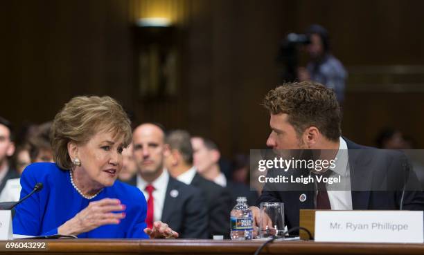 Former Senator Elizabeth Dole and Ryan Phillippe, actor, director, and writer, speak before the Senate Special Committee on Aging during a hearing on...